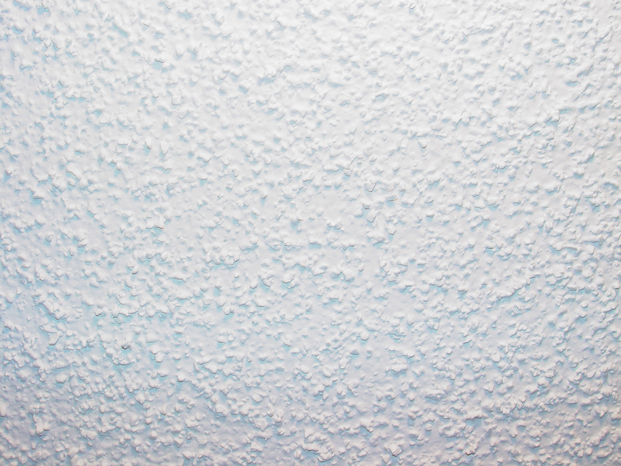 How to remove dust from popcorn ceiling